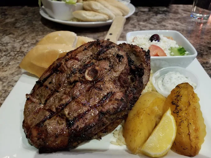 Lamb Chops at Dinakis Mediterranean Grill Port Coquitlam BC - Perfectly grilled lamb chops marinated in Mediterranean herbs and olive oil